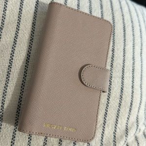 Michael Kors iPhone 6/7 iPhone case, light, pink, and great condition